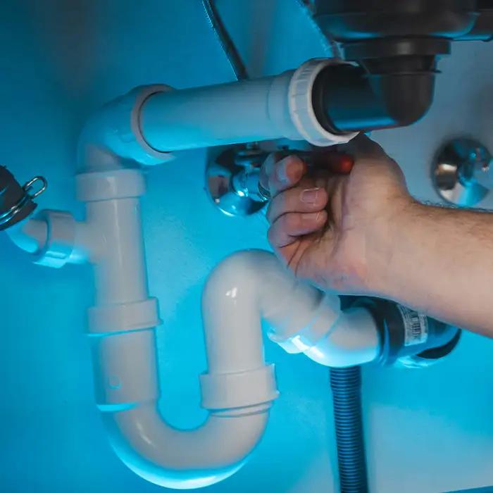working on plumbing